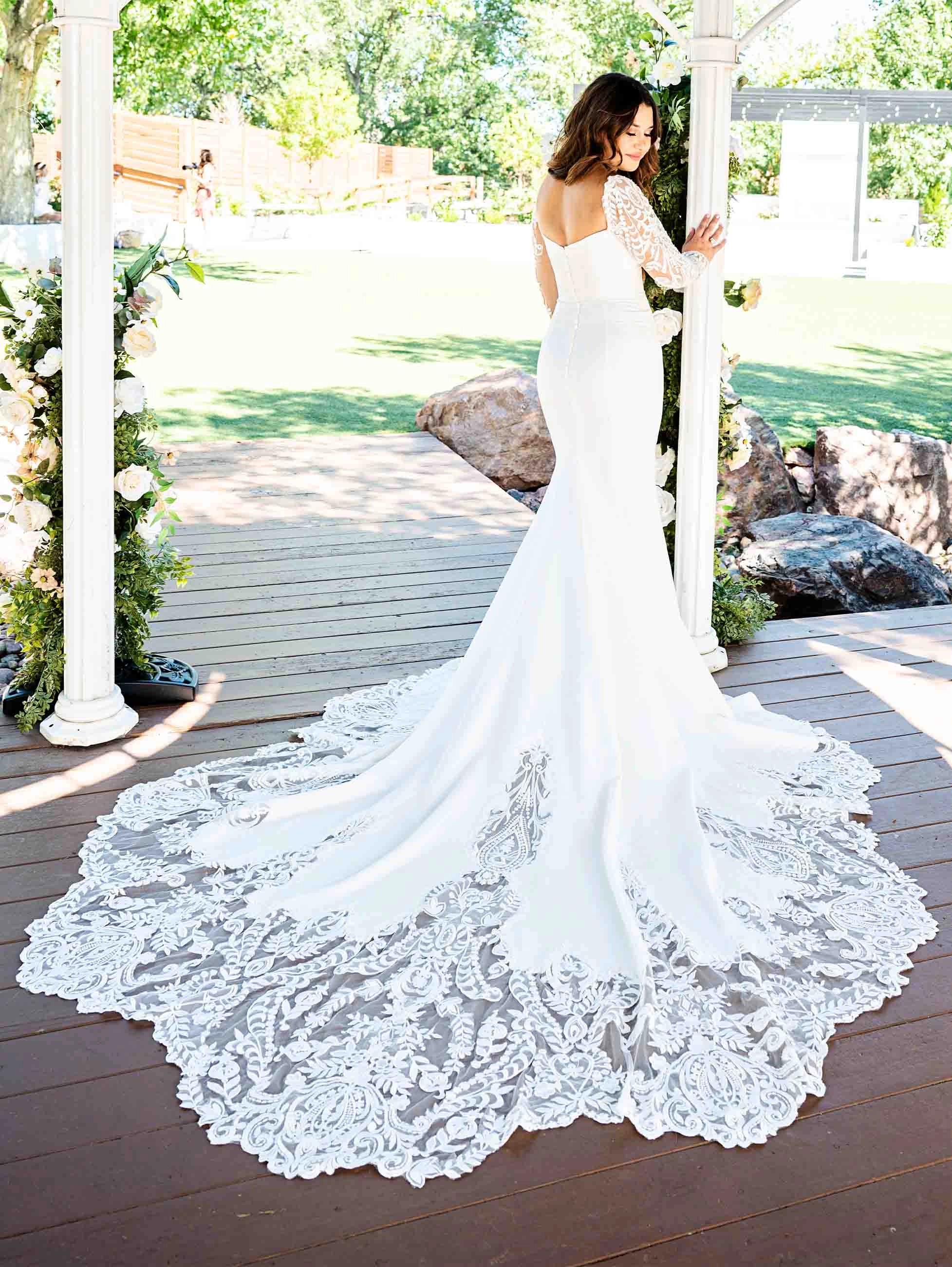 Model wearing a Wedding Dresses dress